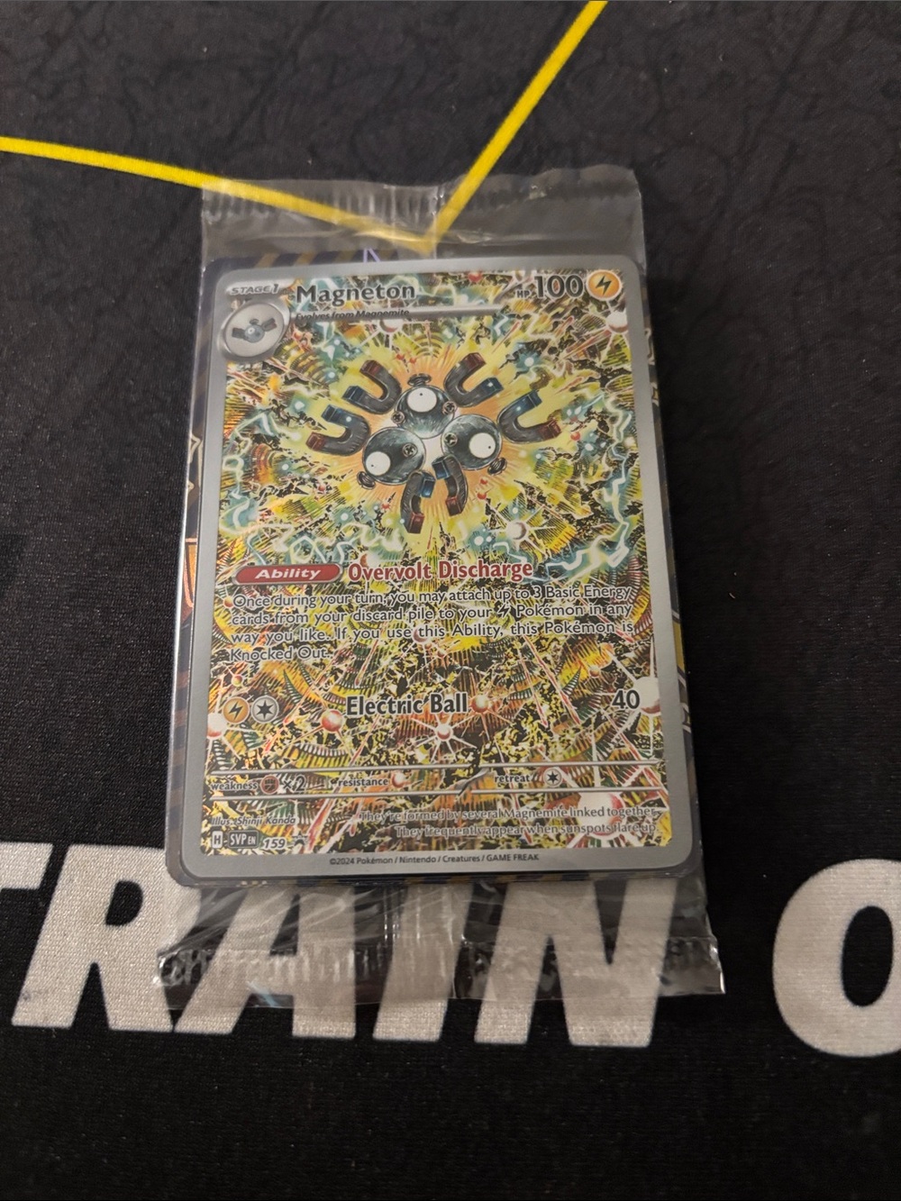 Pokemon Magneton Holofoil Card — Yellow & Black